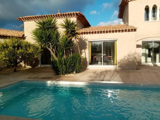 Bienvenue A L Hacienda Villa Magalas Buitenkant foto